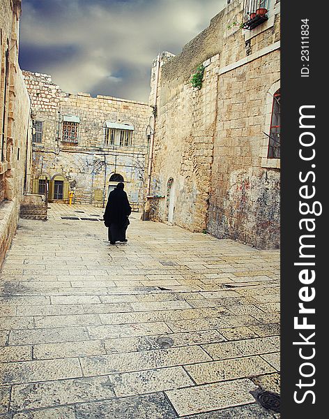 Alone going to a Muslim saint of the ancient streets of Jerusalem. Alone going to a Muslim saint of the ancient streets of Jerusalem