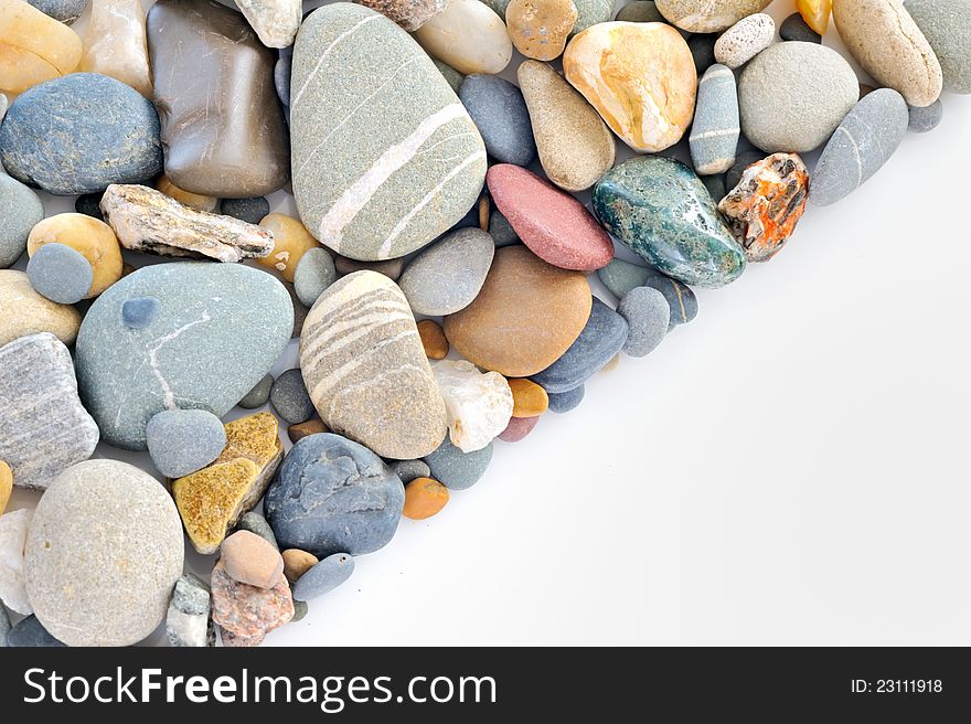 A pile of pebbles isolated on white background