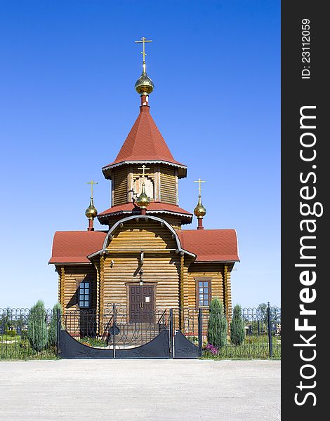 A small chapel on a background of blue sky