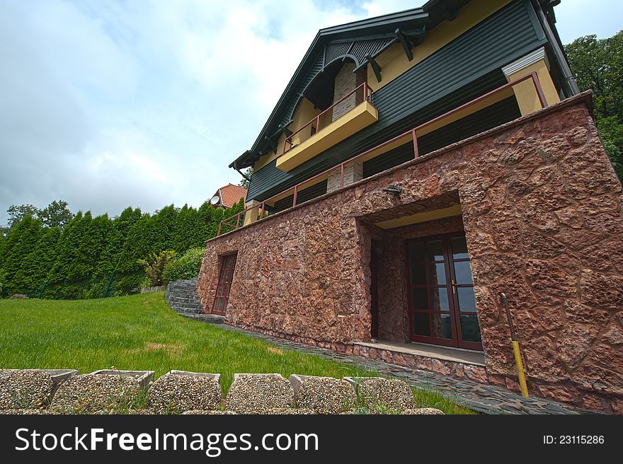 Big Family home with green gras and blue sky. Big Family home with green gras and blue sky