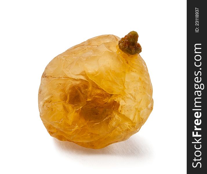 Single raisin against white background