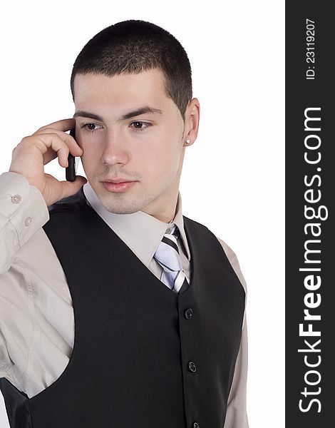 Businessman talking at cellphone, isolated over a white background. Businessman talking at cellphone, isolated over a white background