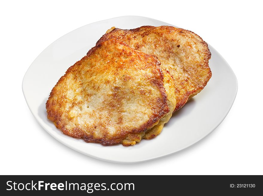 Fried pancakes from the potatoes on white plate, isolated. Fried pancakes from the potatoes on white plate, isolated