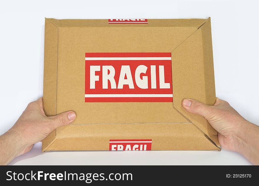 A Cardboard Box Marked Fragile. A Cardboard Box Marked Fragile