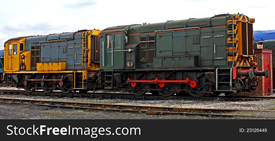 Two Powerful Diesel Electric Locomotive Train Engines.