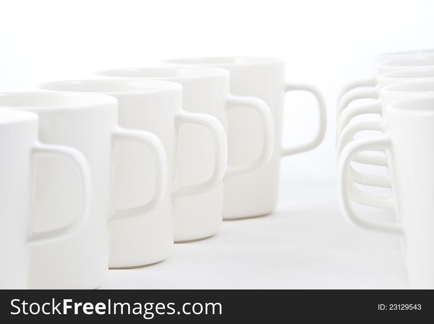Line of white cups, on white background