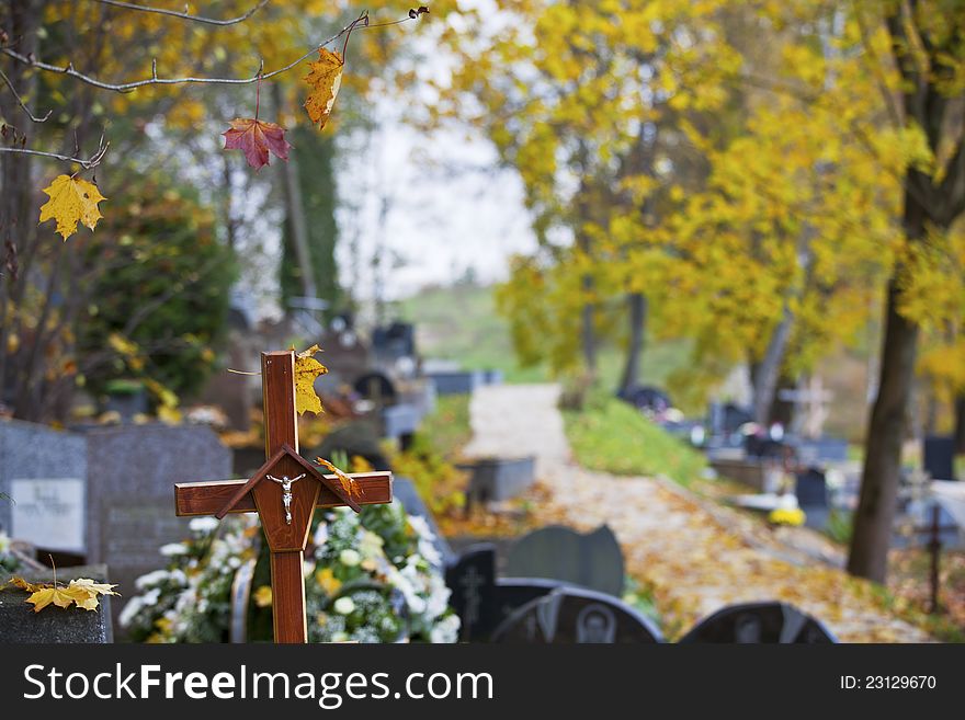 Wooden cross on Christian cemetery