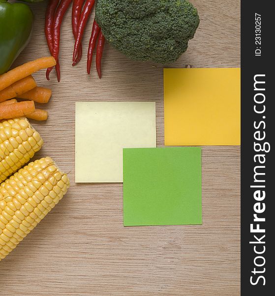 Health grocery concept of vegetables. You can put your text on the note. Health grocery concept of vegetables. You can put your text on the note