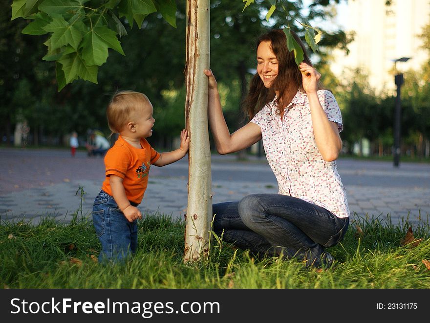 Mother and son playing and smiling each other