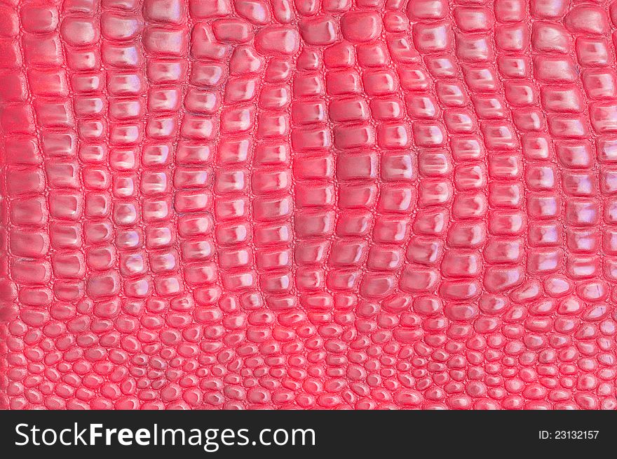 Red leather texture closeup, useful as background