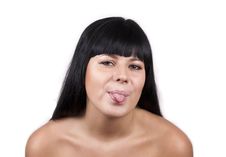 Young Brunette Woman With Her Tongue Out Royalty Free Stock Photos Young Brunette Woman With Her Tongue Out Royalty Free Stock Photos