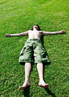 The Young Man Has A Rest On A Grass Stock Photography The Young Man Has A Rest On A Grass Stock Photography