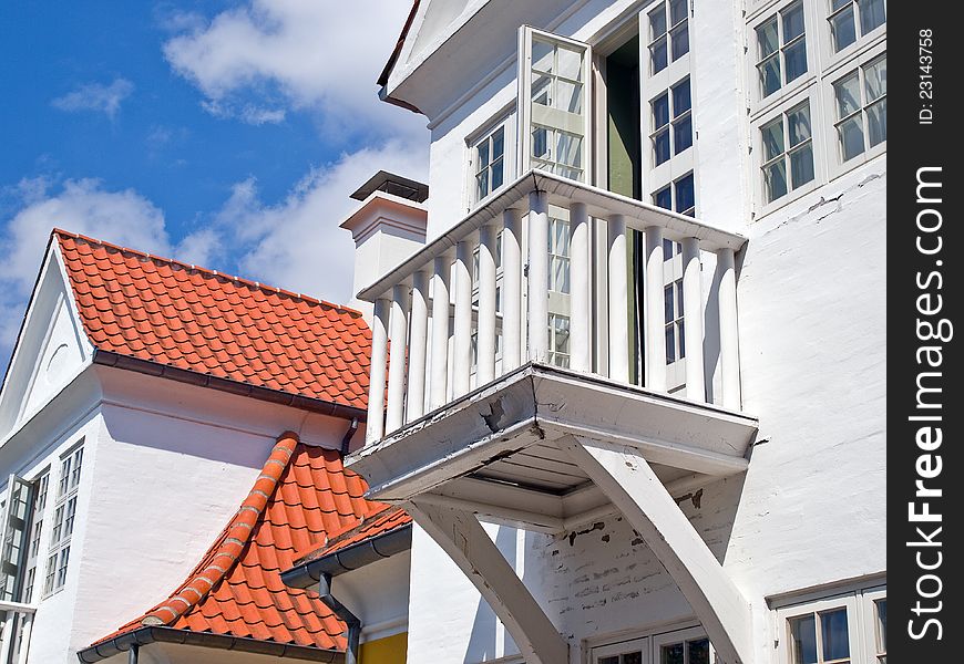 Details of a small wooden balcony in a traditional house Denmark