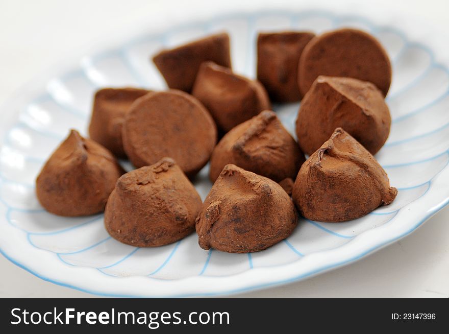 Delicious chocolate truffles in the dish