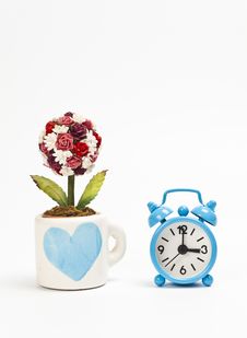Blue Cup Wiht Heart Symbol And Blue Alarm Clock Royalty Free Stock Photos Blue Cup Wiht Heart Symbol And Blue Alarm Clock Royalty Free Stock Photos