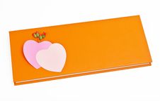 Orange Love Diary With Two Small Notes Stock Photo