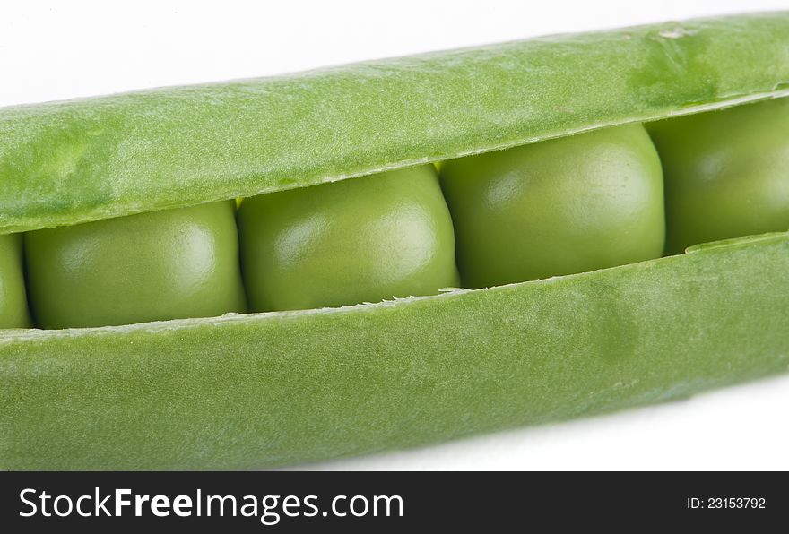 Green peas are photographed close-up. Green peas are photographed close-up
