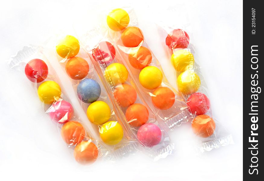 Colorful gum balls on white