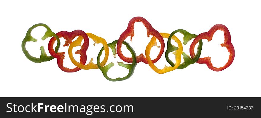 Slices Of Pepper On White Isolated Background