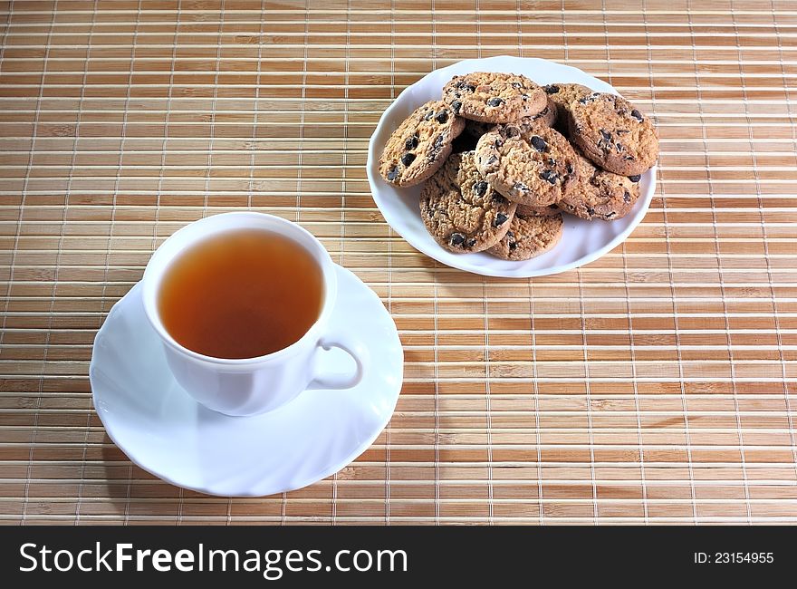 Cup of tea and cookies on the saucer