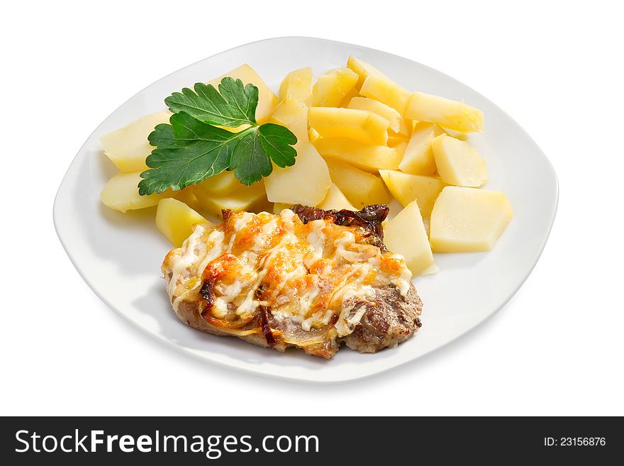 Pork chop with potatoes on white plate, isolated. Pork chop with potatoes on white plate, isolated