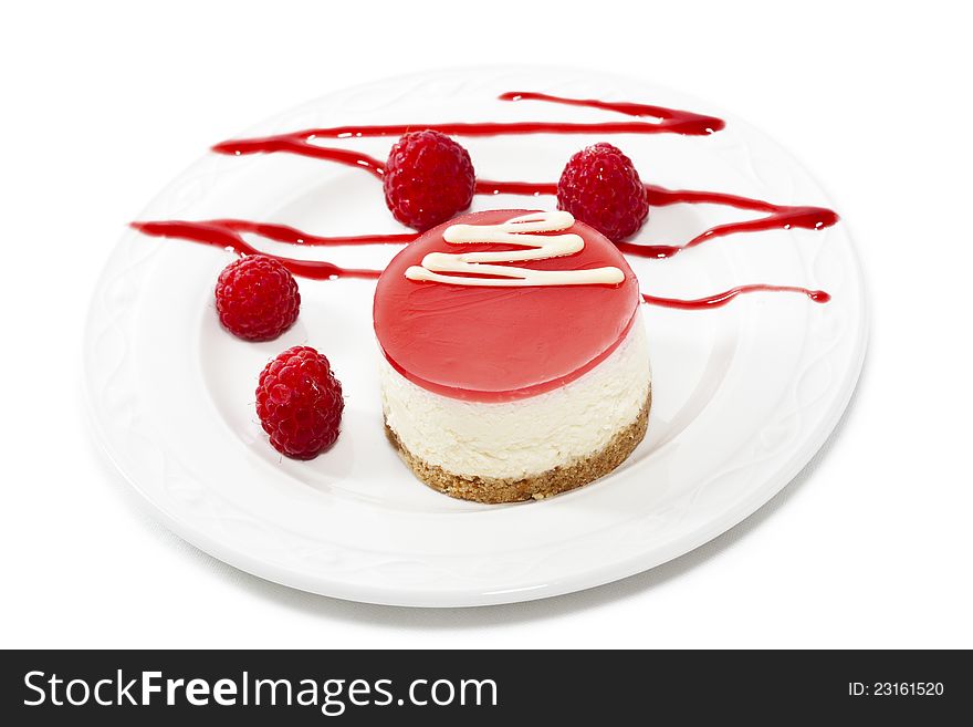 Cheese cake with raspberries. Close up.