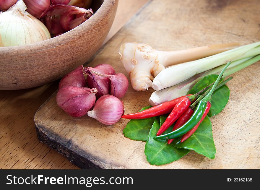 Asian hot and spicy food ingredient with onions in wooden bowl. Asian hot and spicy food ingredient with onions in wooden bowl