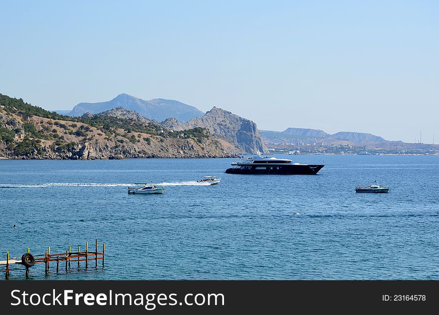 Rest in the summer in Crimea in Ukraine. A kind from the sea on settlement a New World.