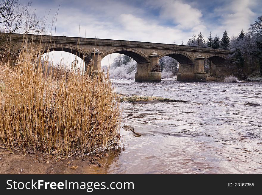 Winter morning showing Bywell bridge over the river Tyne near Stocksfield