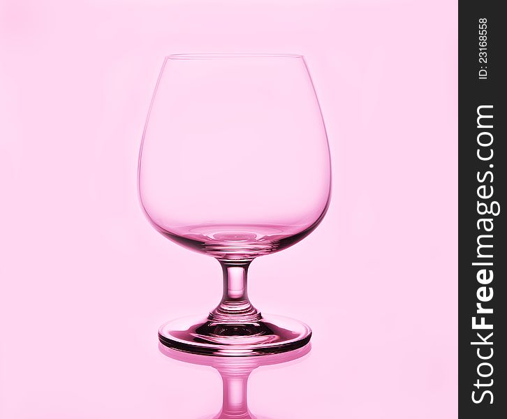 Brandy Glass On Pink Background