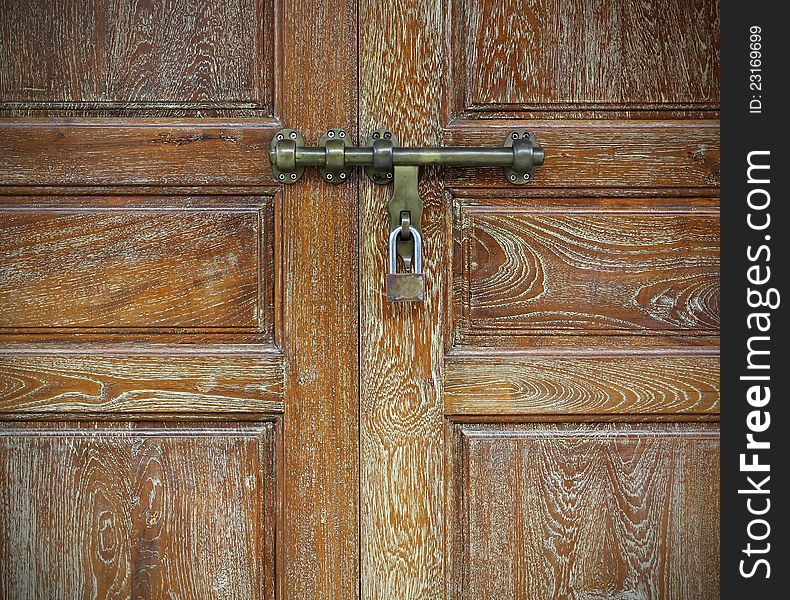 Locked old wooden door safe concept