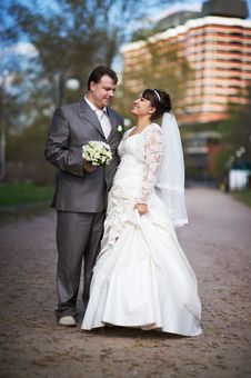 Happy Bride And Groom At A Wedding Walk Royalty Free Stock Photos Happy Bride And Groom At A Wedding Walk Royalty Free Stock Photos