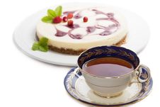 A Cup Of Tea With Cheesecake Royalty Free Stock Image