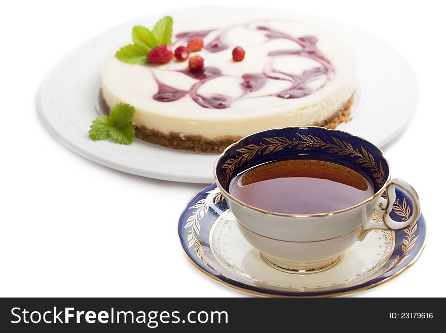 A Cup Of Tea With Cheesecake