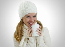 Girl In A Winter Hat And Scarf With Mug Of Drink Stock Images Girl In A Winter Hat And Scarf With Mug Of Drink Stock Images