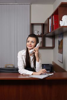 Smiling Businesswoman Talking On Phone And Writing Royalty Free Stock Photos Smiling Businesswoman Talking On Phone And Writing Royalty Free Stock Photos