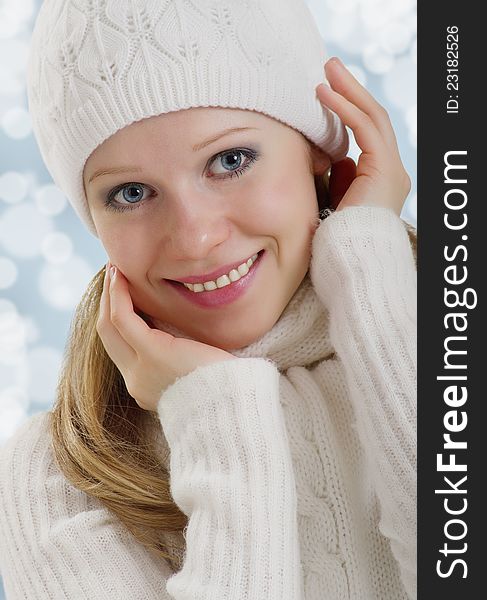 Beautiful happy young woman outdoors in winter