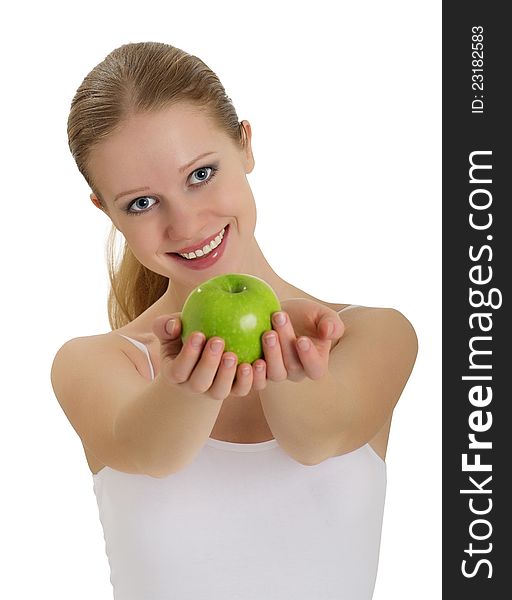 Beautiful young woman holding a ripe apple isolated on white background. Beautiful young woman holding a ripe apple isolated on white background