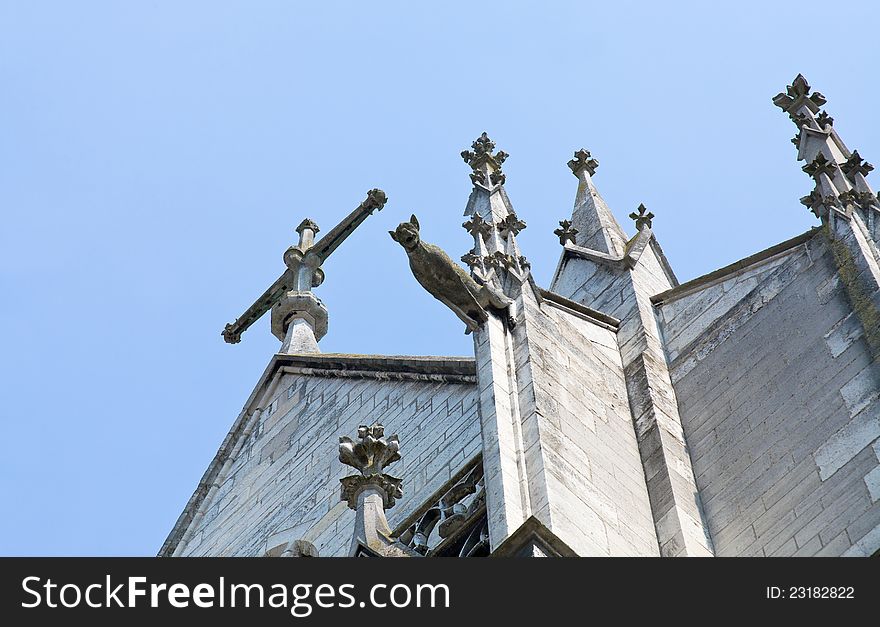 Fragment of wall of basilica with gargoyle  in Troyes, France