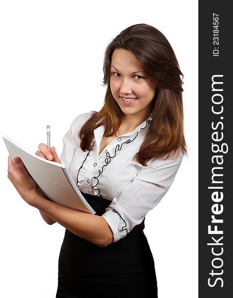 Girl with a notebook and pen on a white background. Girl with a notebook and pen on a white background