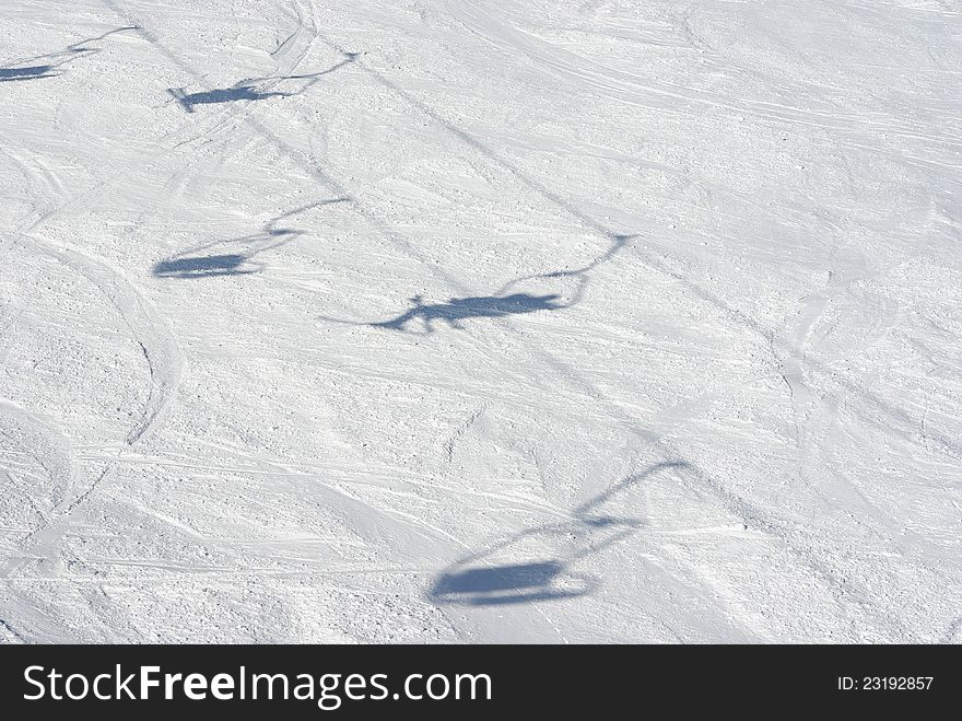 A shadow of a ski lift. A shadow of a ski lift