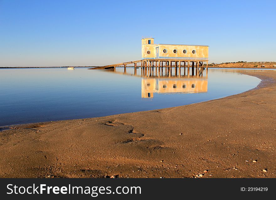 Old historic life-guard building in Fuseta, at Ria Formosa conservation park, Algarve. Portugal. Old historic life-guard building in Fuseta, at Ria Formosa conservation park, Algarve. Portugal