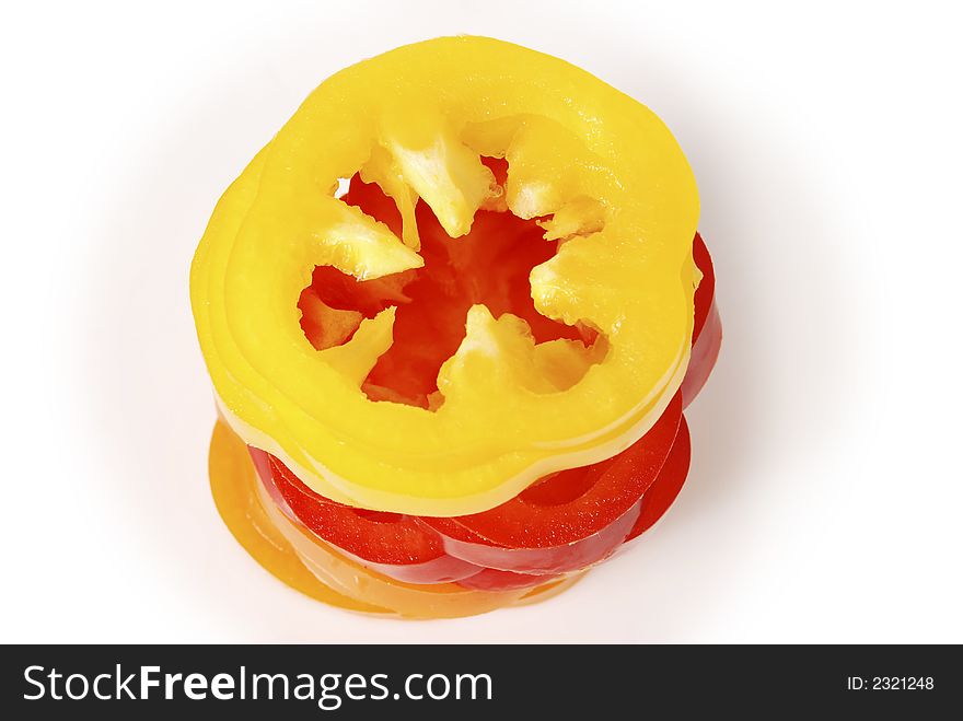 Sliced yellow, red, orange pepers isolated on white background. Sliced yellow, red, orange pepers isolated on white background