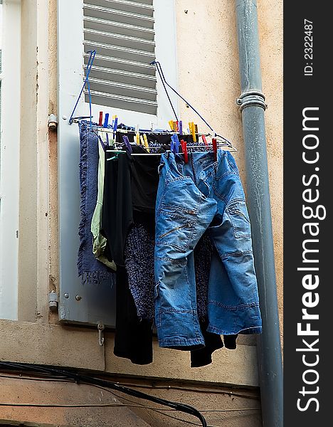 Jeans hanging on a rack