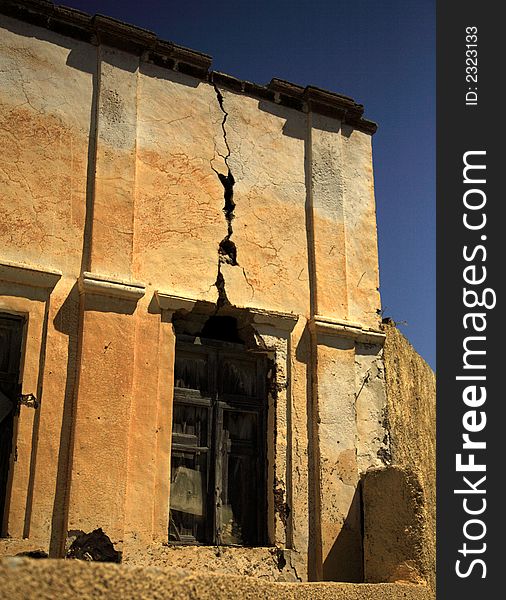 Old ruined and cracked building Santorini Greece