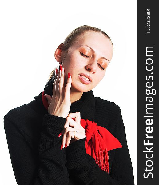 The girl in a red scarf and a black sweater over white. The girl in a red scarf and a black sweater over white