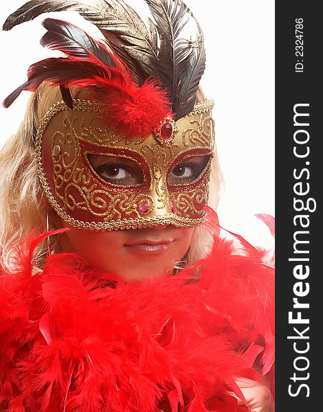 Portrait of attractive beautiful young woman wearing red carnival mask. Portrait of attractive beautiful young woman wearing red carnival mask