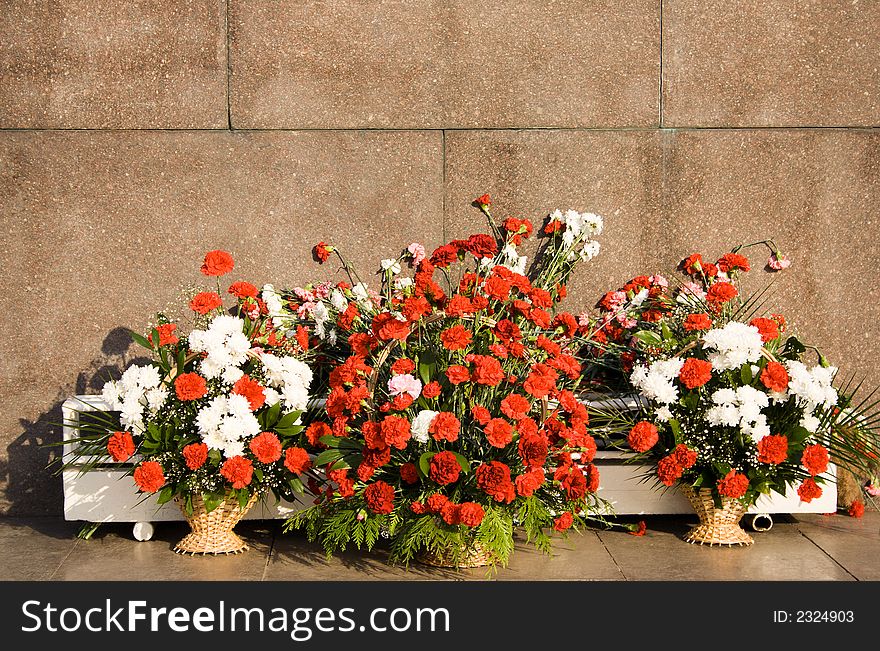 Marble monument with fresh flowers