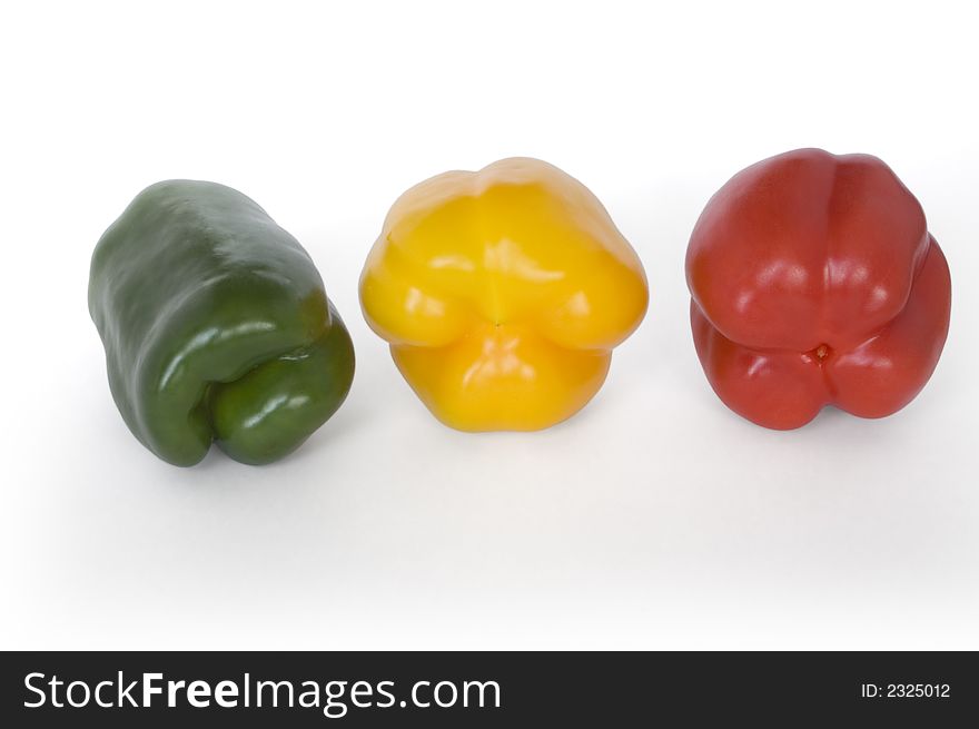 Three coloured peppers (isolated on white)