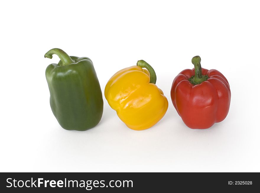 Three coloured peppers (isolated on white)